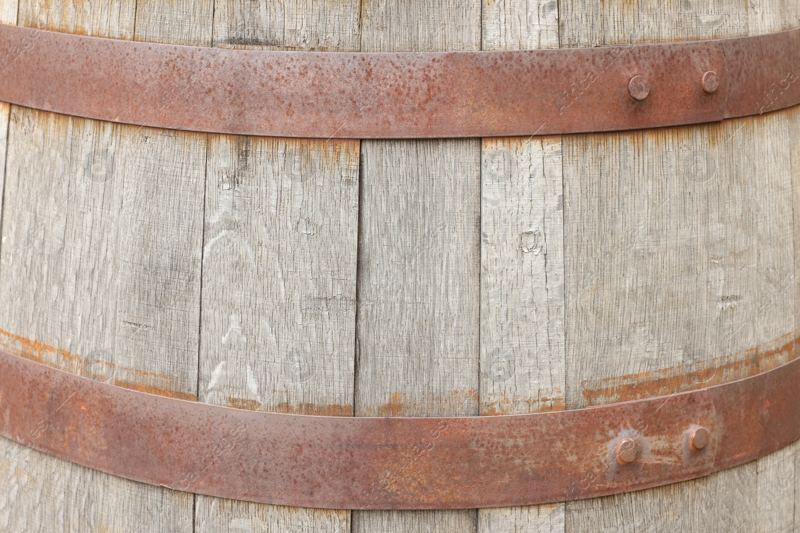 Photo of Traditional wooden barrel as background, closeup. Wine making