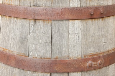 Traditional wooden barrel as background, closeup. Wine making