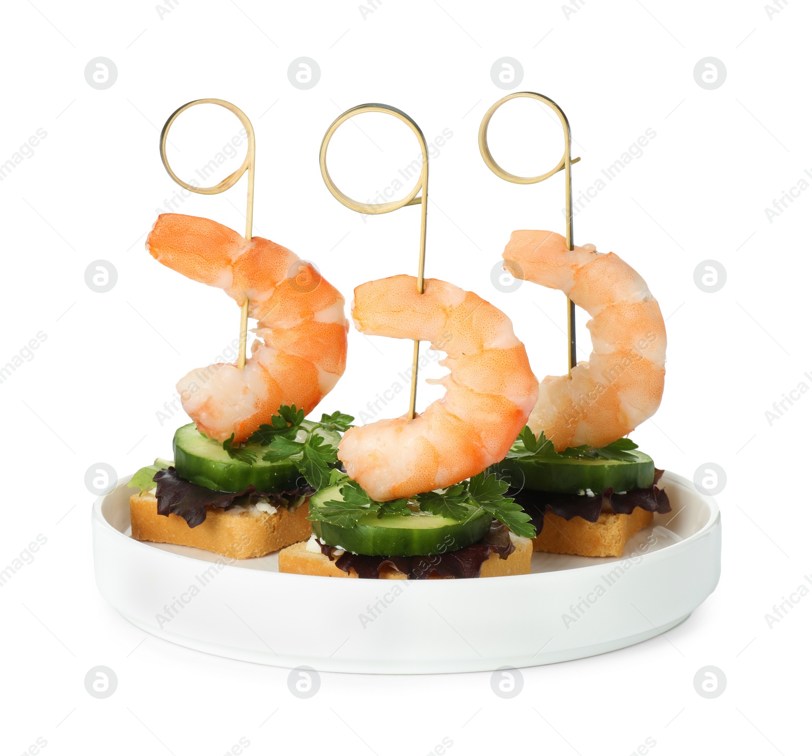 Photo of Tasty canapes with shrimps, greens and cucumber isolated on white