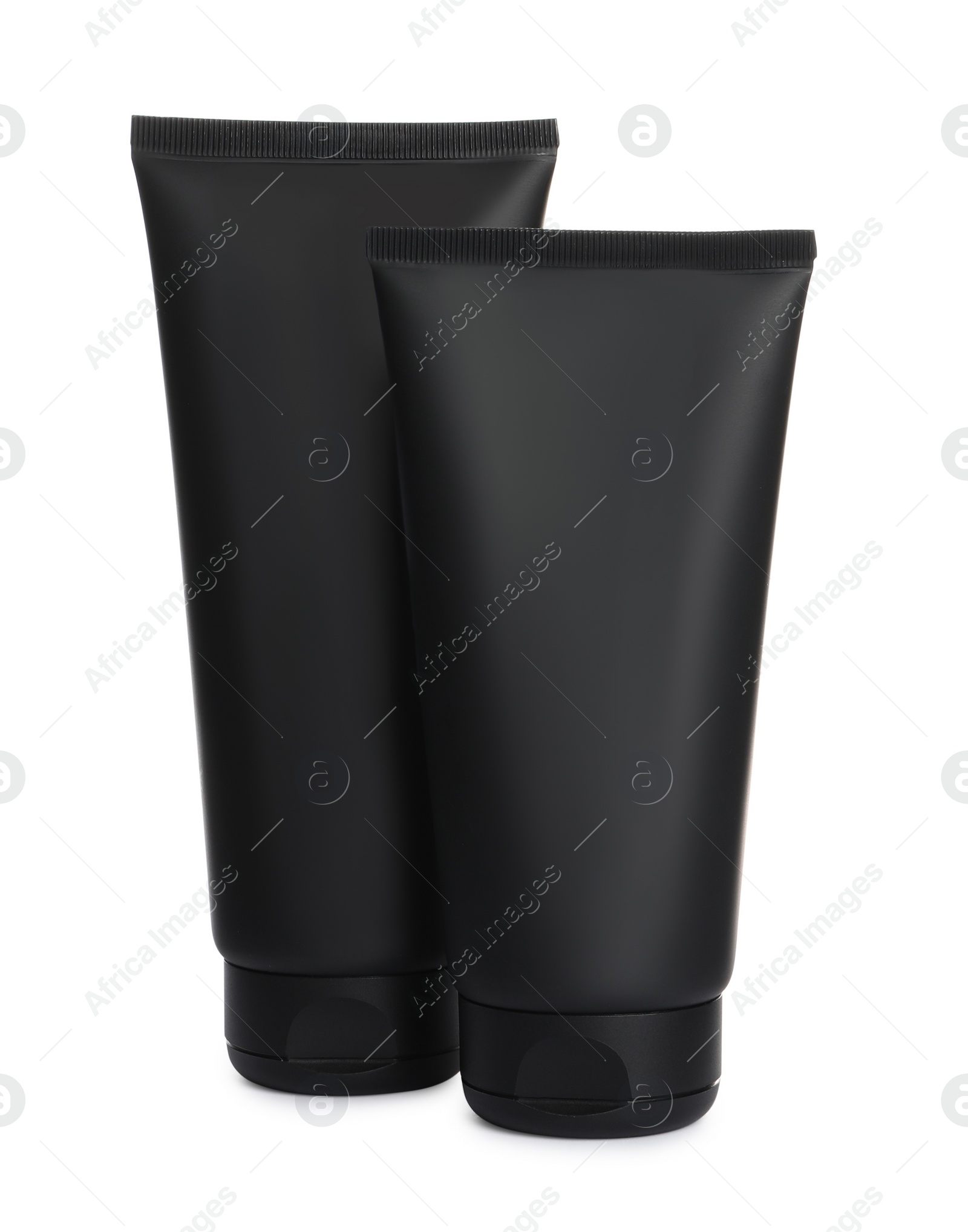 Photo of Tubes of men's facial creams on white background. Mockup for design