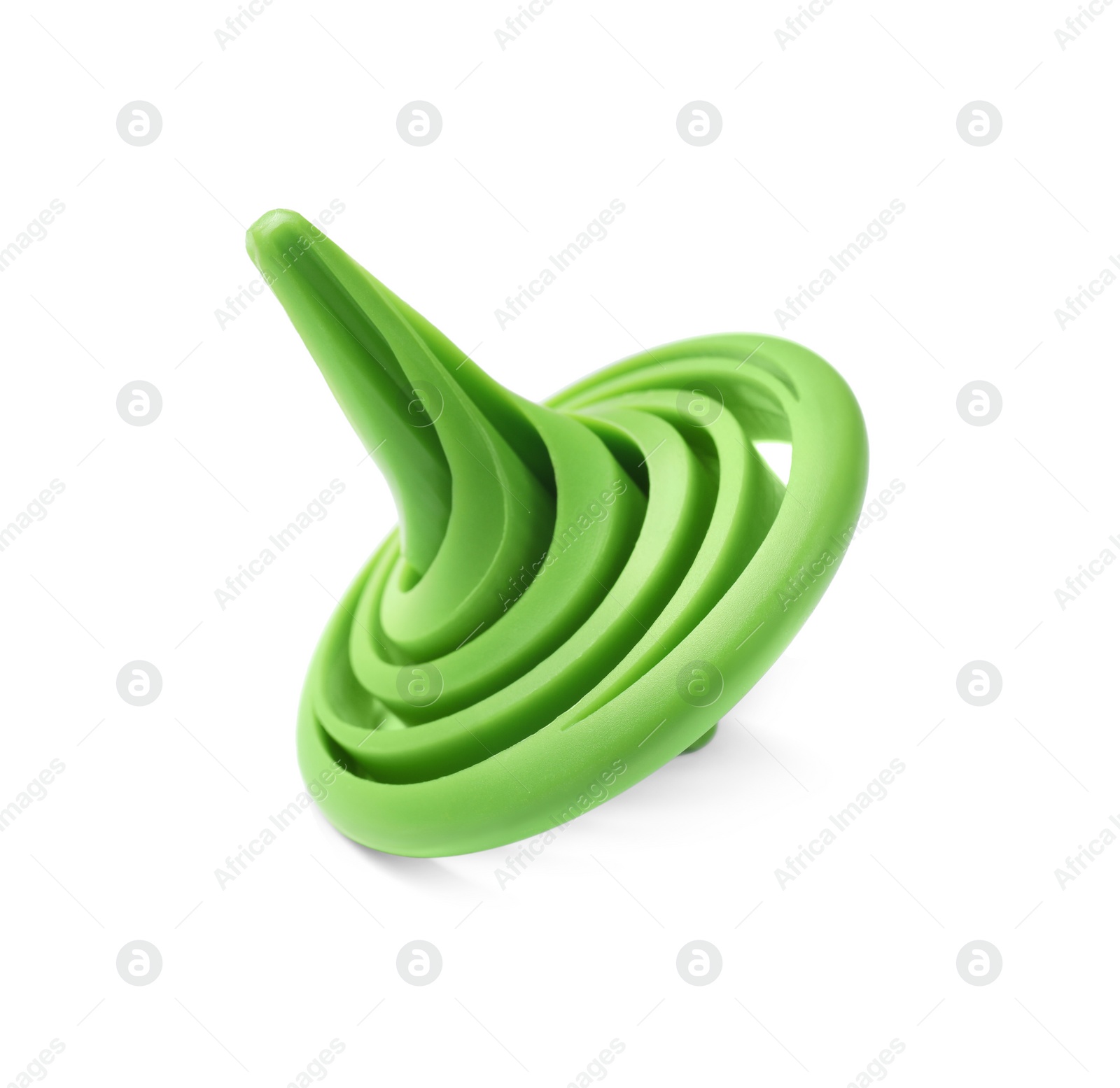 Photo of One green spinning top isolated on white