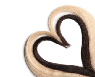 Photo of Heart made of blond and brown hair locks on white background