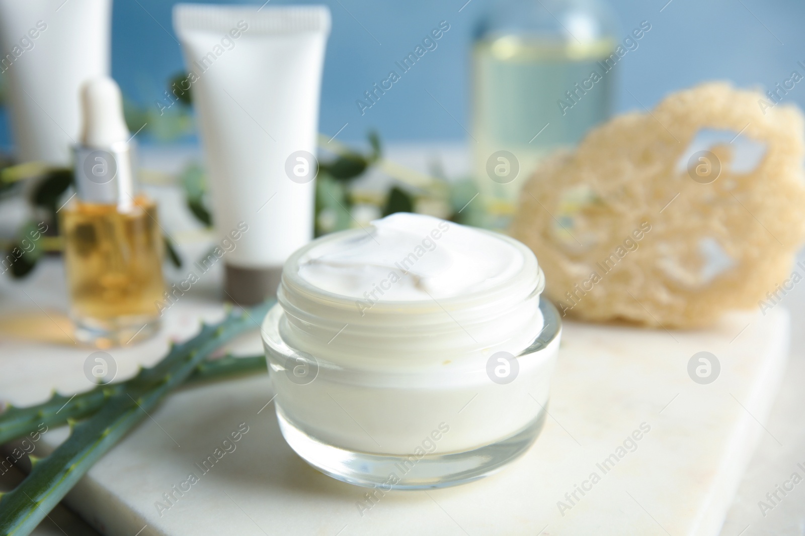 Photo of Jar of body care product on table. Mockup for design