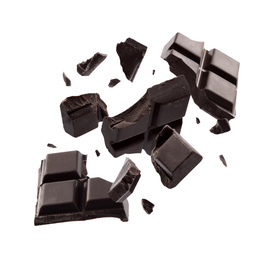 Image of Dark chocolate explosion, pieces shattering on white background