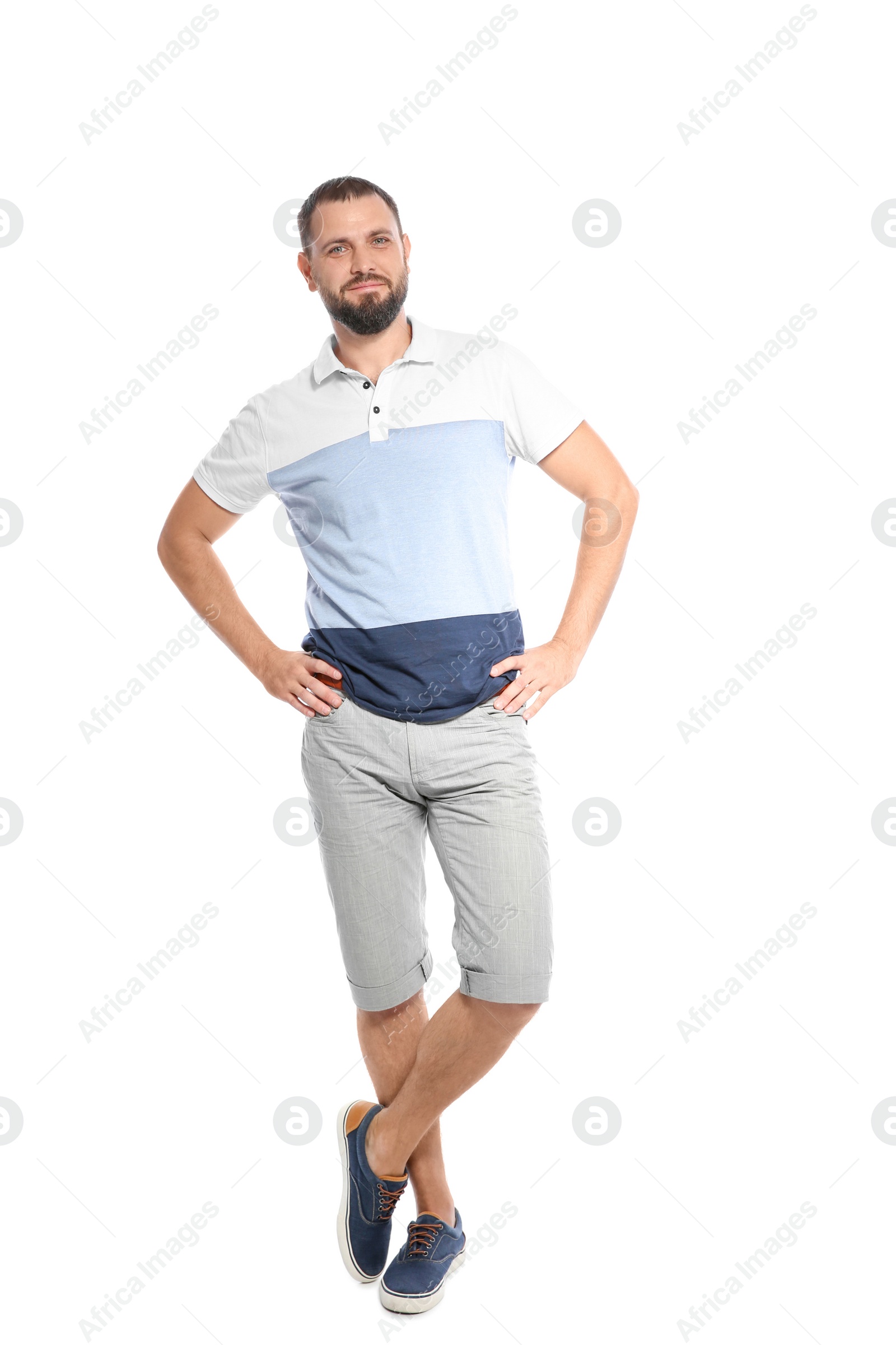 Photo of Full length portrait of man in casual clothes on white background