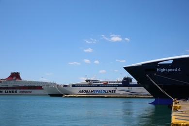 PIRAEUS, GREECE - MAY 19, 2022: Picturesque view of port with Speedrunner III vessel on sunny day