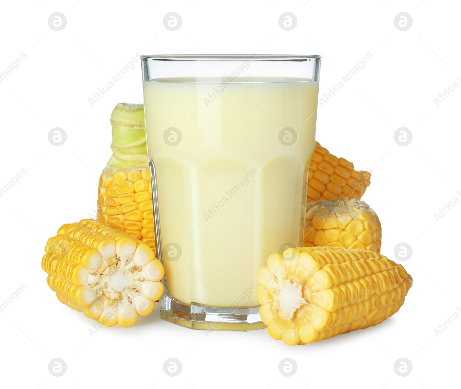 Photo of Tasty fresh corn milk in glass and cobs on white background