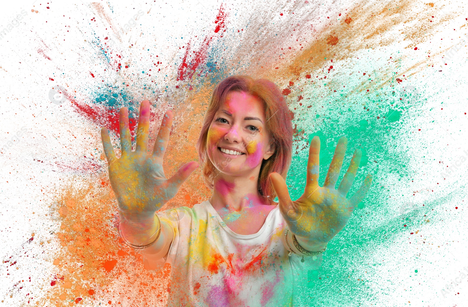 Image of Holi festival celebration. Happy woman covered with colorful powder dyes on white background