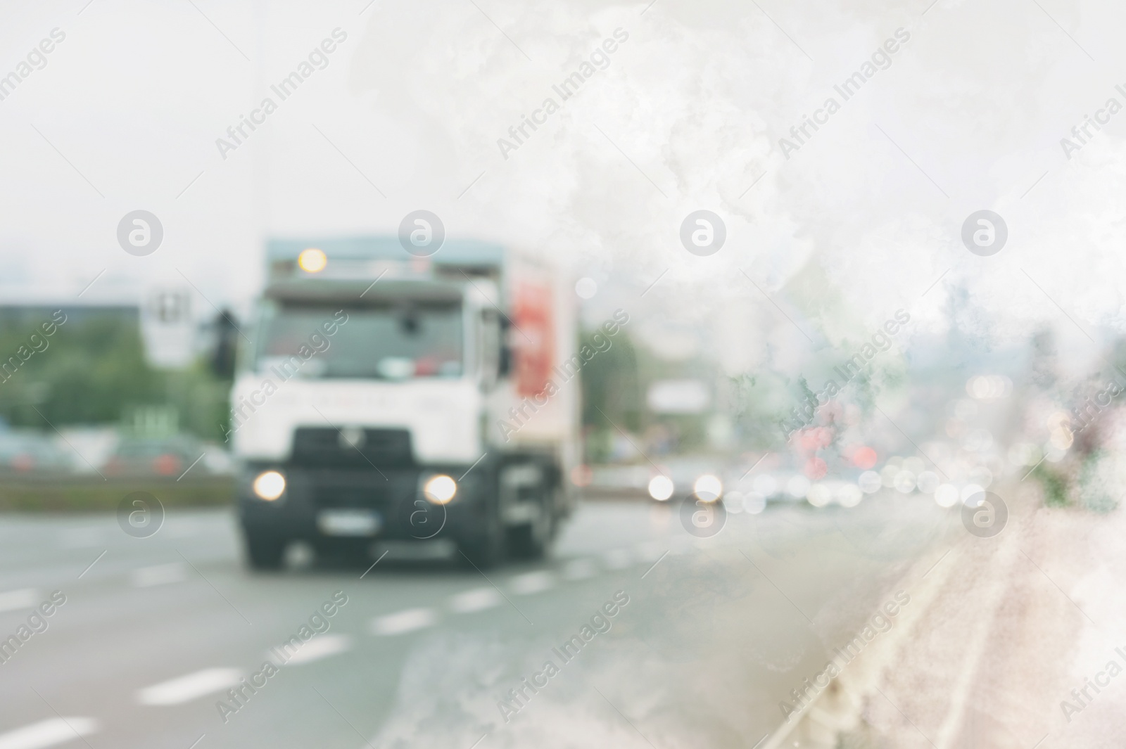 Image of Environmental pollution. Air contaminated with fumes in city. Cars surrounded by exhaust on road, blurred view