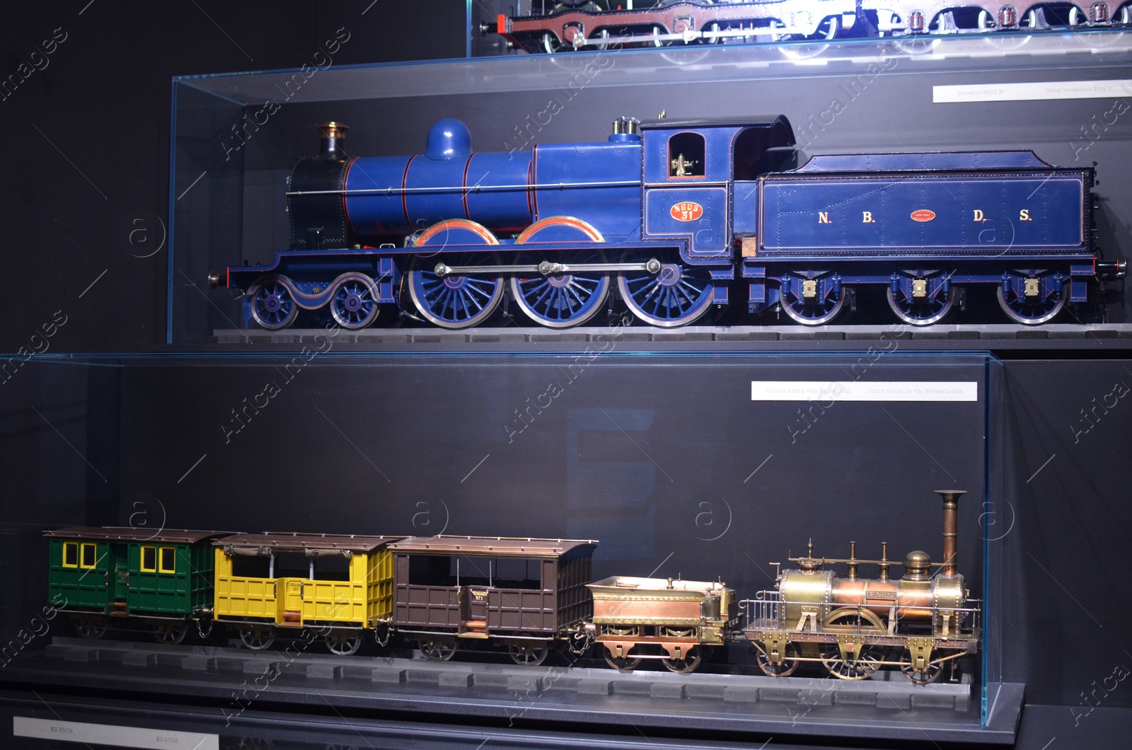 Photo of Utrecht, Netherlands - July 23, 2022: Models of different old trains on display in Spoorwegmuseum