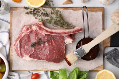 Photo of Flat lay composition with raw meat, thyme and marinade on white tiled table