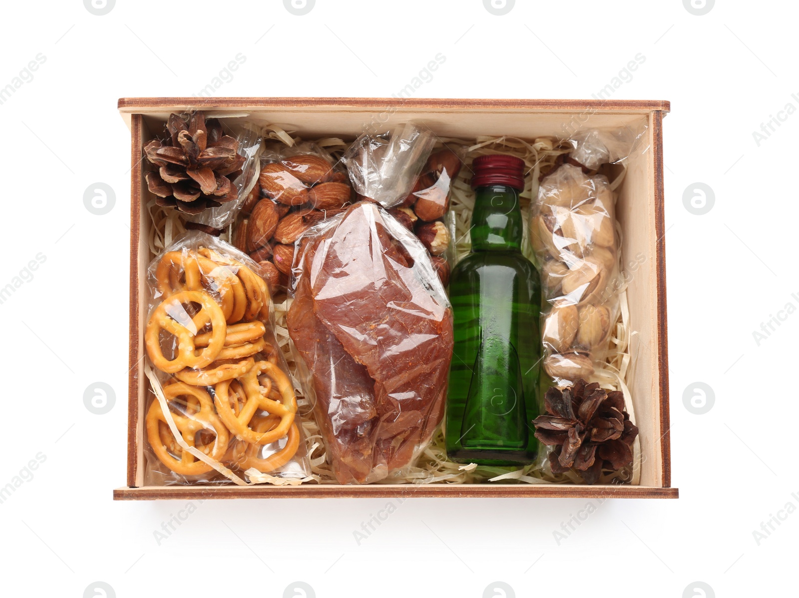 Photo of Stylish gift set in wooden box isolated on white, top view