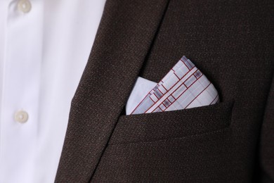 Photo of Man with handkerchief in suit pocket, closeup