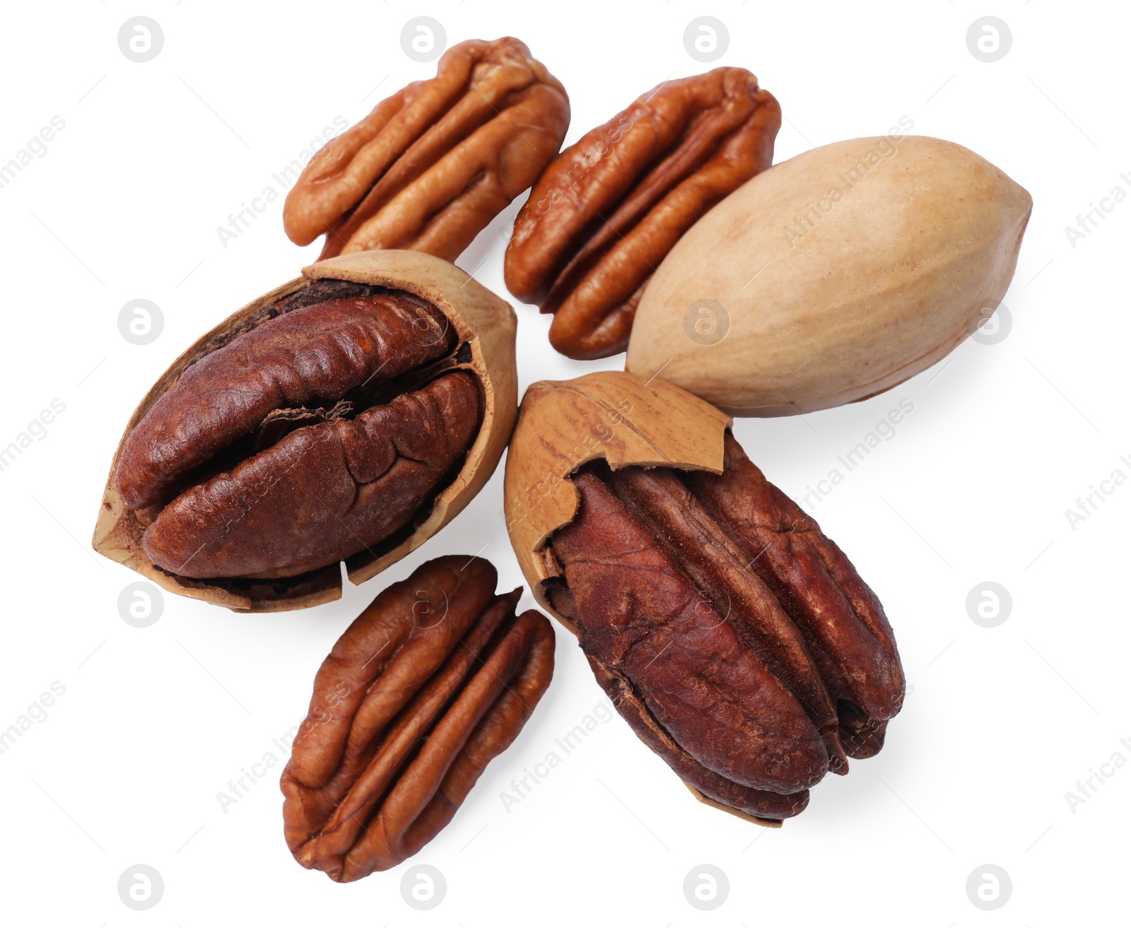 Photo of Many tasty pecan nuts isolated on white