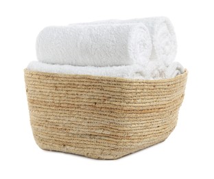 Photo of Wicker laundry basket with clean towels isolated on white