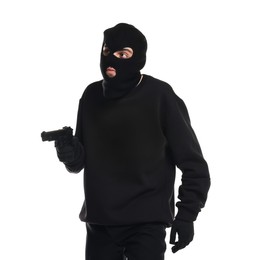 Thief in balaclava with gun on white background