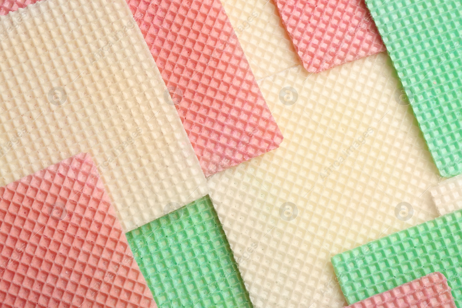 Photo of Tasty wafers as background, closeup. Crispy food