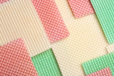 Photo of Tasty wafers as background, closeup. Crispy food