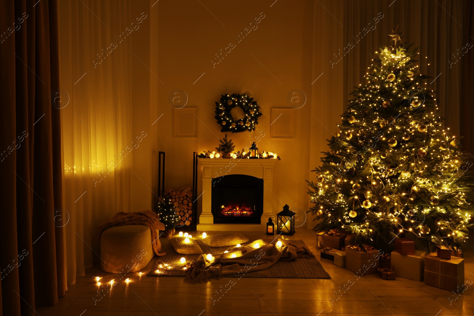 Photo of Beautiful living room interior with burning fireplace and Christmas tree in evening