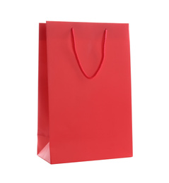 Photo of Red paper shopping bag isolated on white