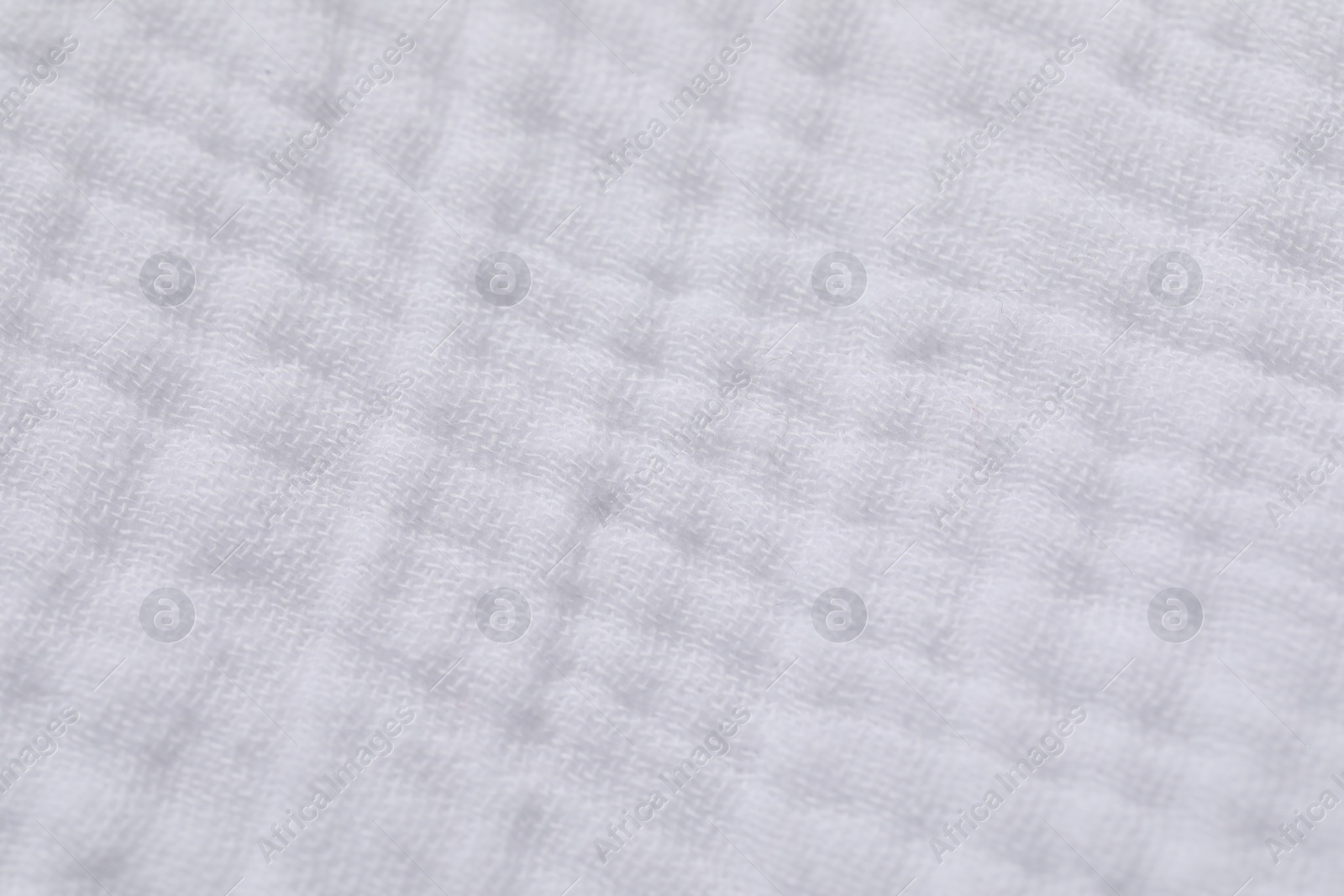 Photo of Texture of soft white fabric as background, top view