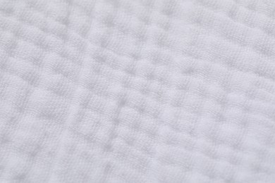 Photo of Texture of soft white fabric as background, top view