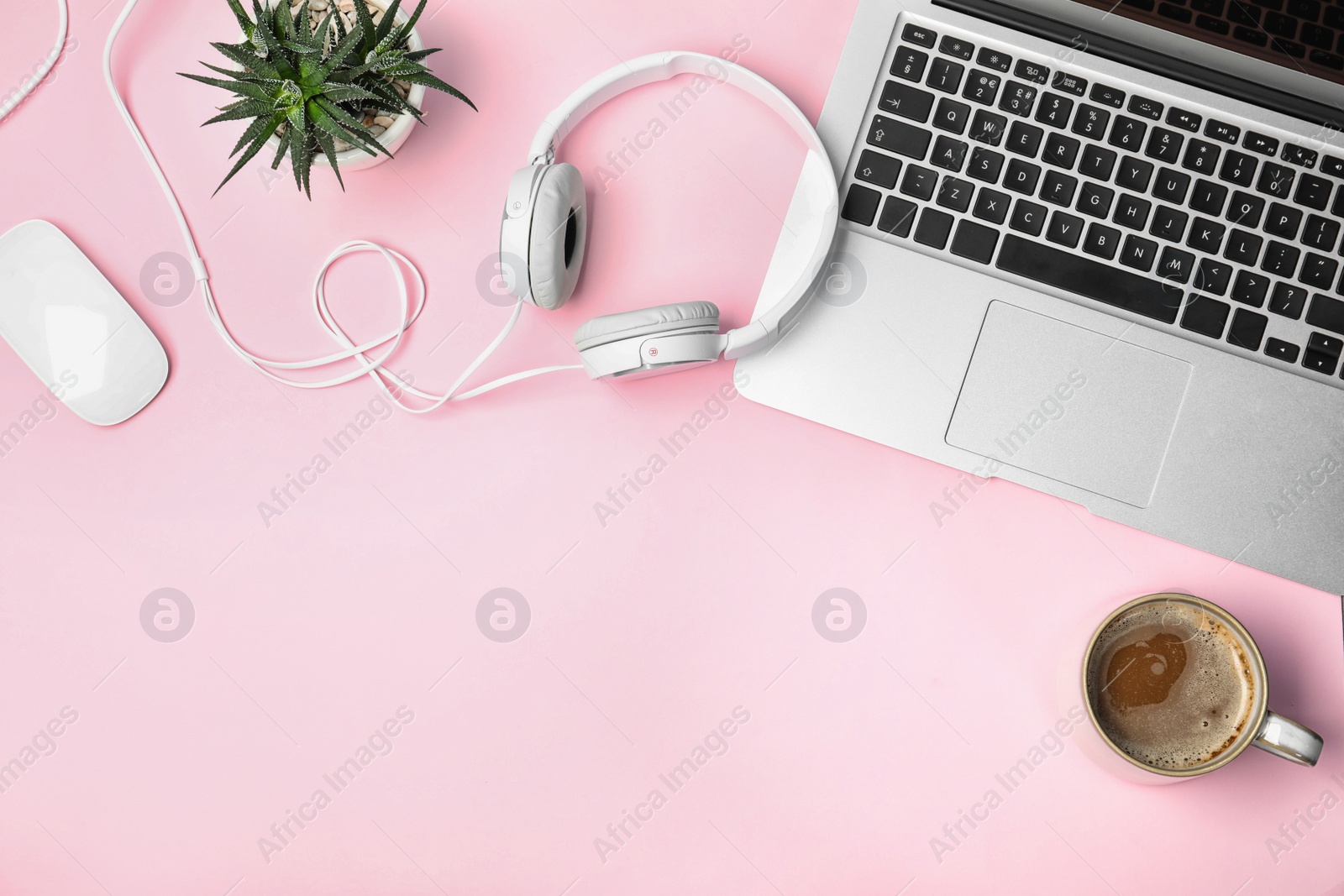 Photo of Flat lay composition with headphones, laptop and space for text on color background