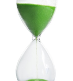 Photo of Hourglass with flowing sand on table against white background. Time management