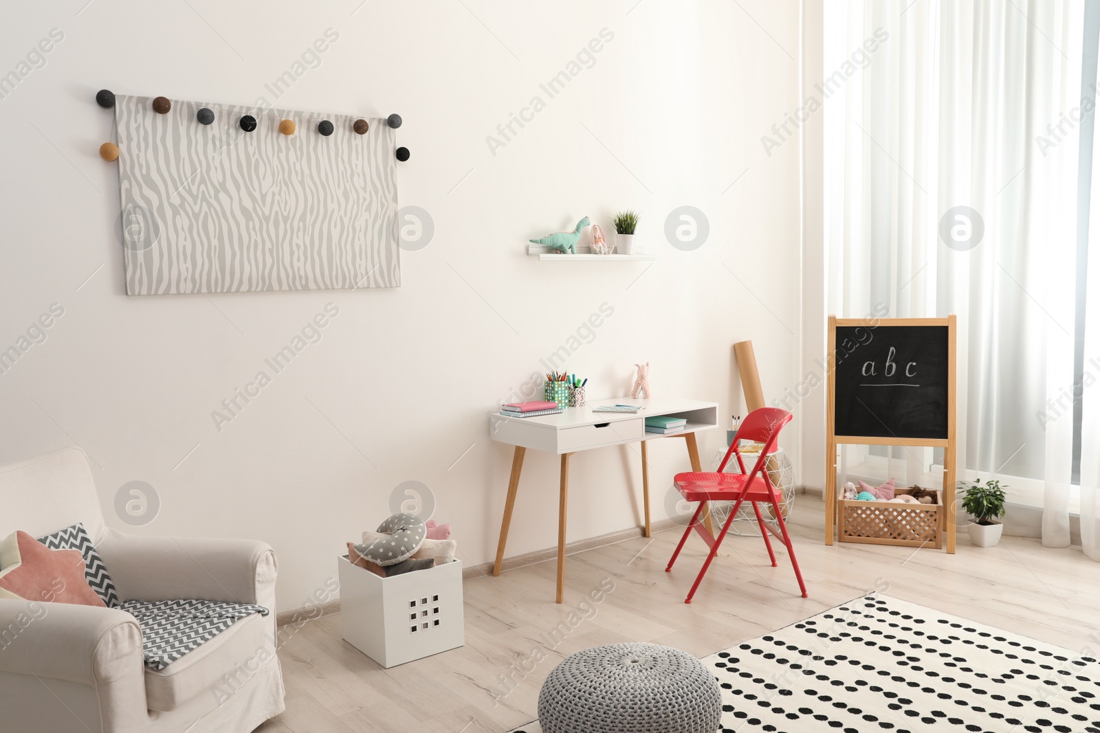 Photo of Modern child room interior with stylish furniture