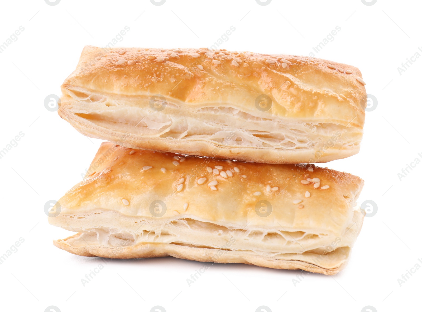 Photo of Delicious fresh puff pastries isolated on white