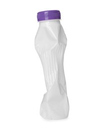 Photo of Crumpled disposable plastic bottle isolated on white