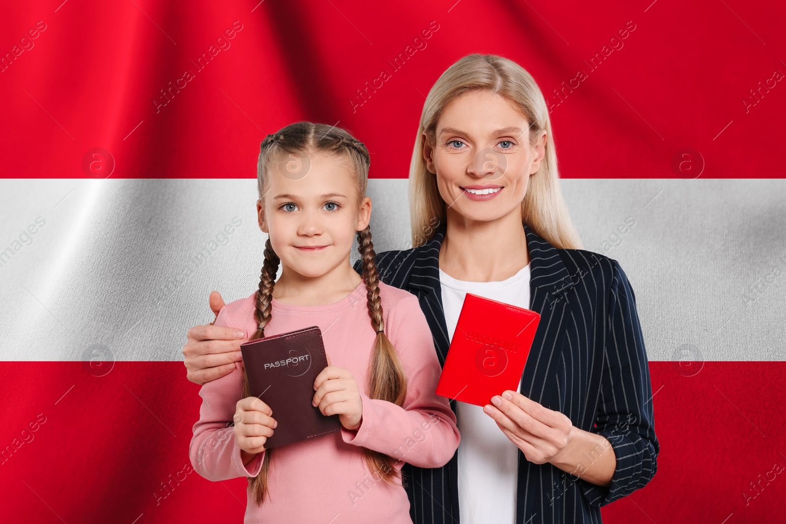 Image of Immigration. Happy woman and her daughter with passports against national flag of Austria