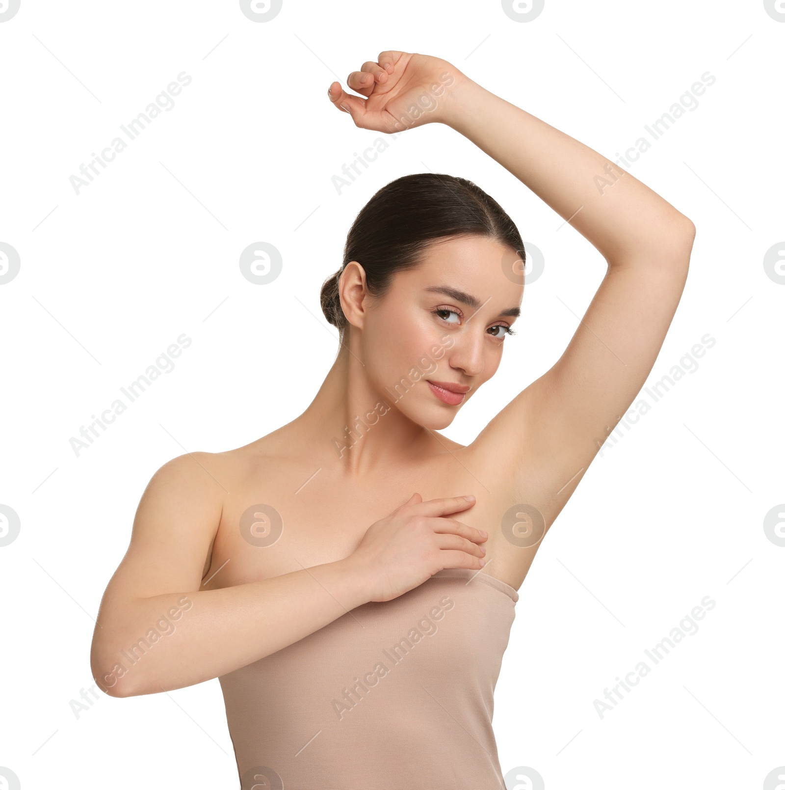 Photo of Beautiful woman showing armpit with smooth clean skin on white background