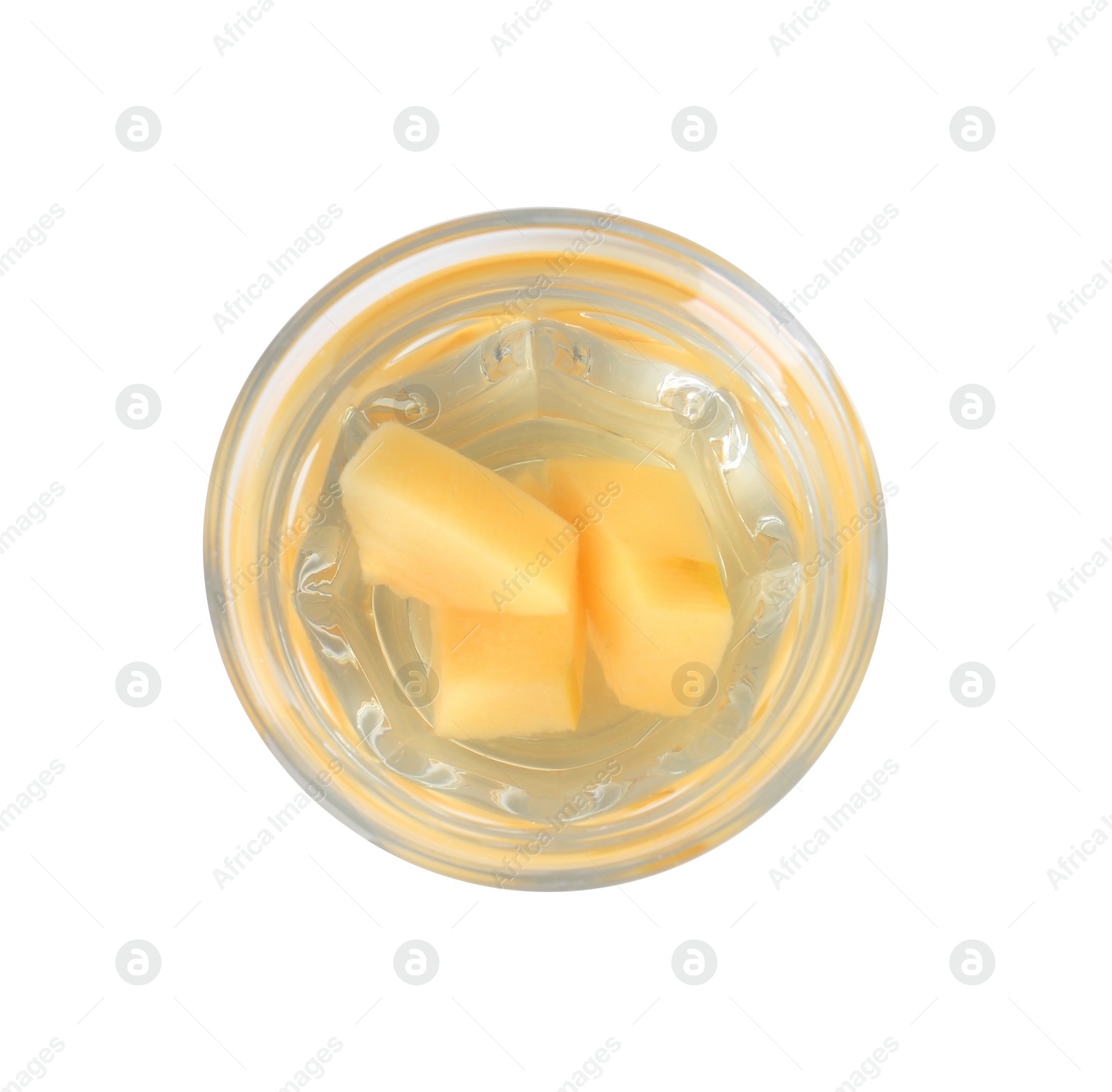 Photo of Delicious quince drink in glass isolated on white, top view