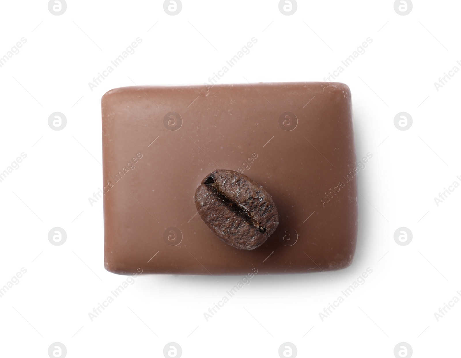 Photo of Delicious milk chocolate candy with coffee bean isolated on white, top view