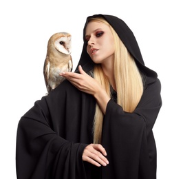 Witch in black mantle with owl isolated on white. Scary fantasy character