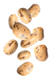 Many beans falling on white background. Vegan diet 