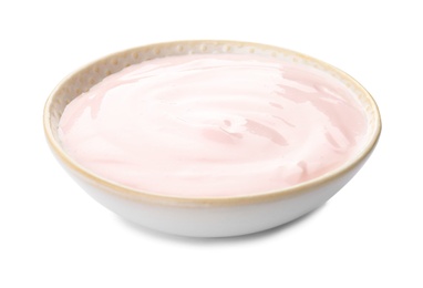 Plate with yummy yogurt on white background