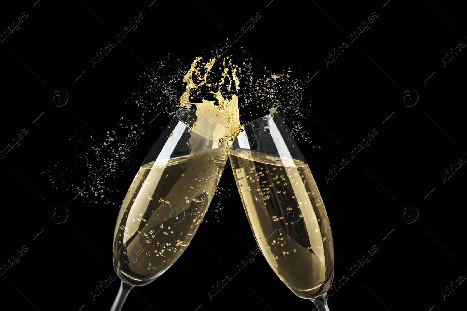 Image of Clinking glasses of sparkling wine with splash on black background