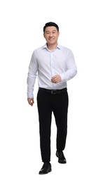 Photo of Businessman in formal clothes walking on white background