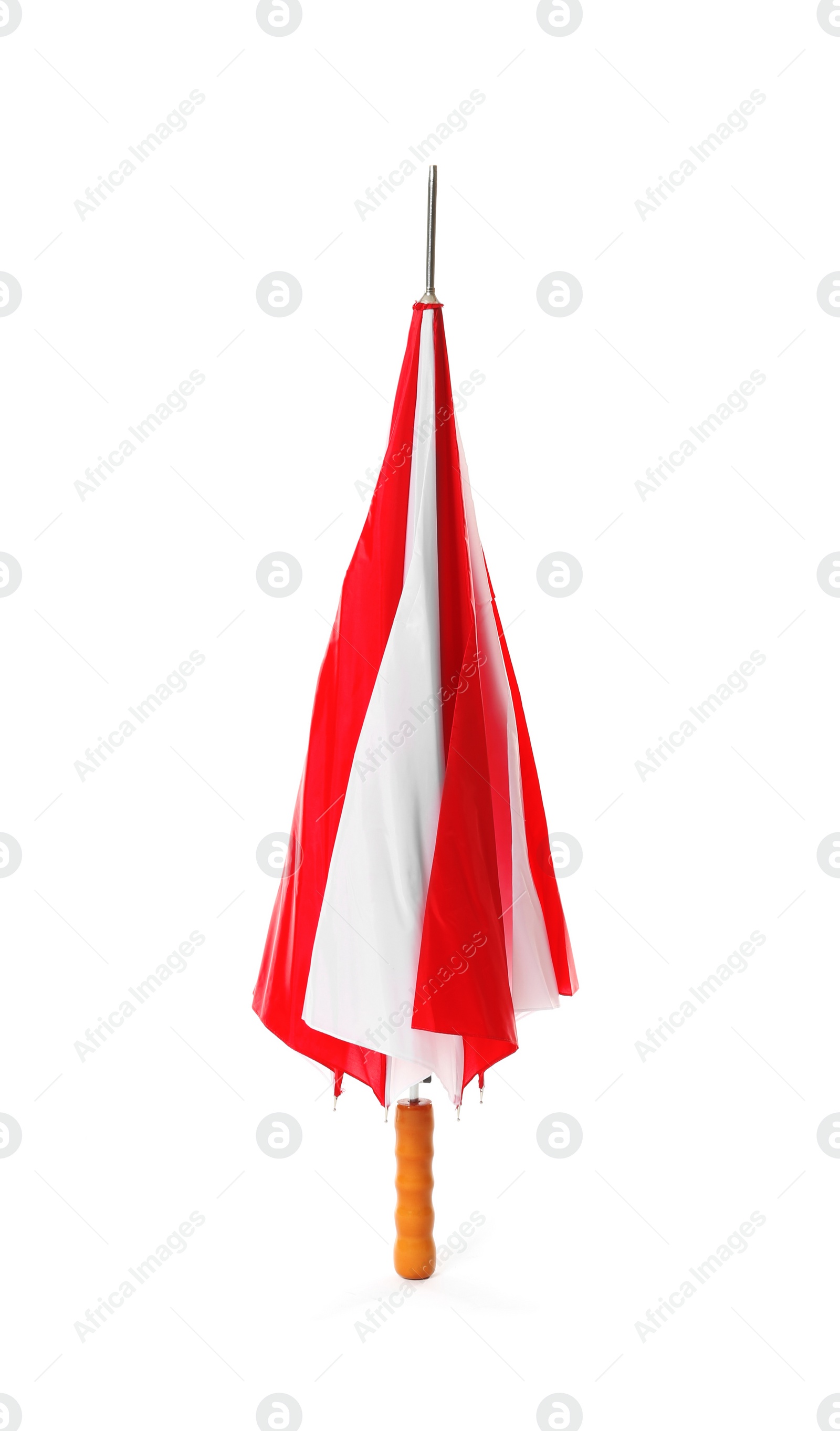 Photo of Modern closed bright umbrella isolated on white