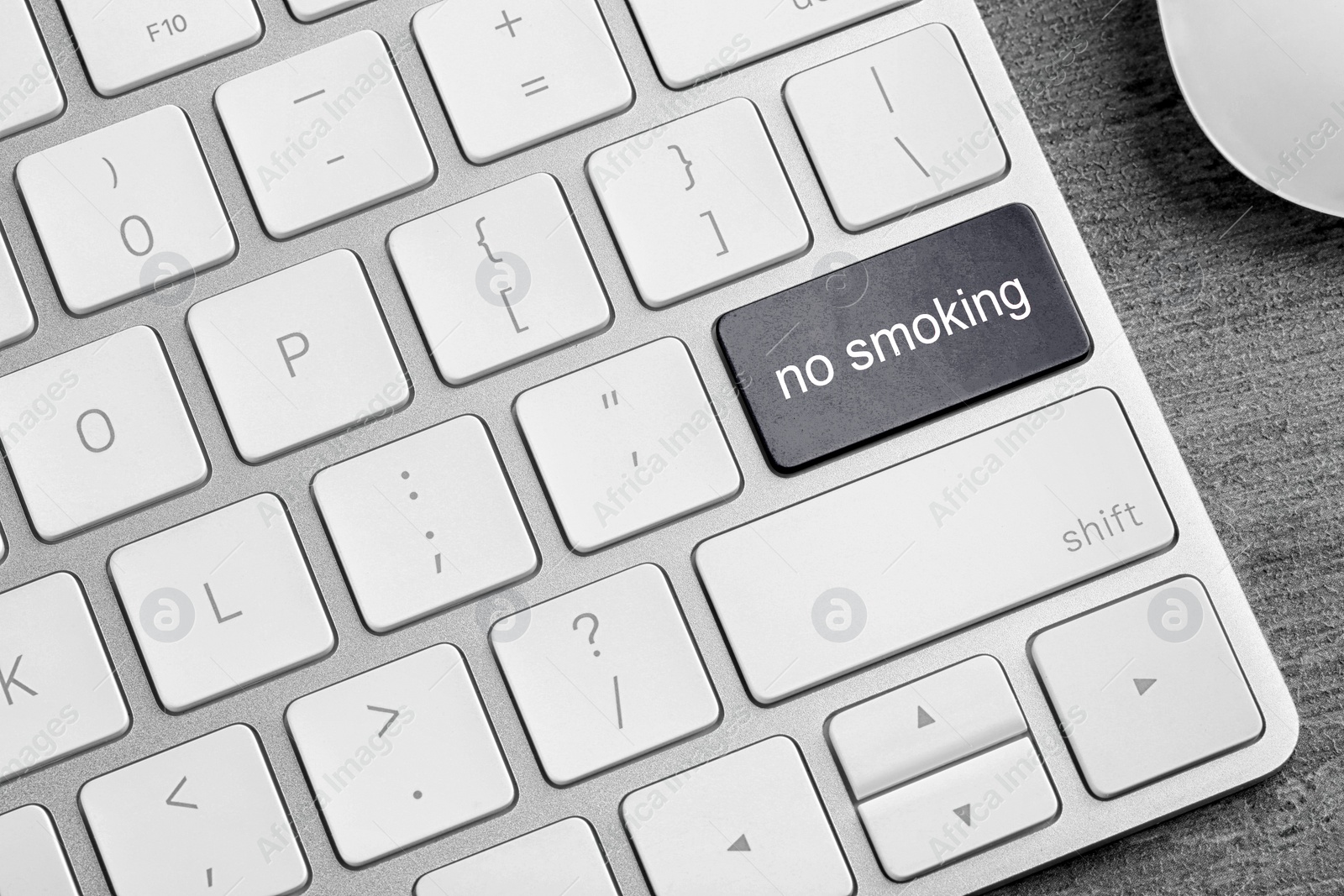 Image of Grey button with phrase No smoking on computer keyboard, top view