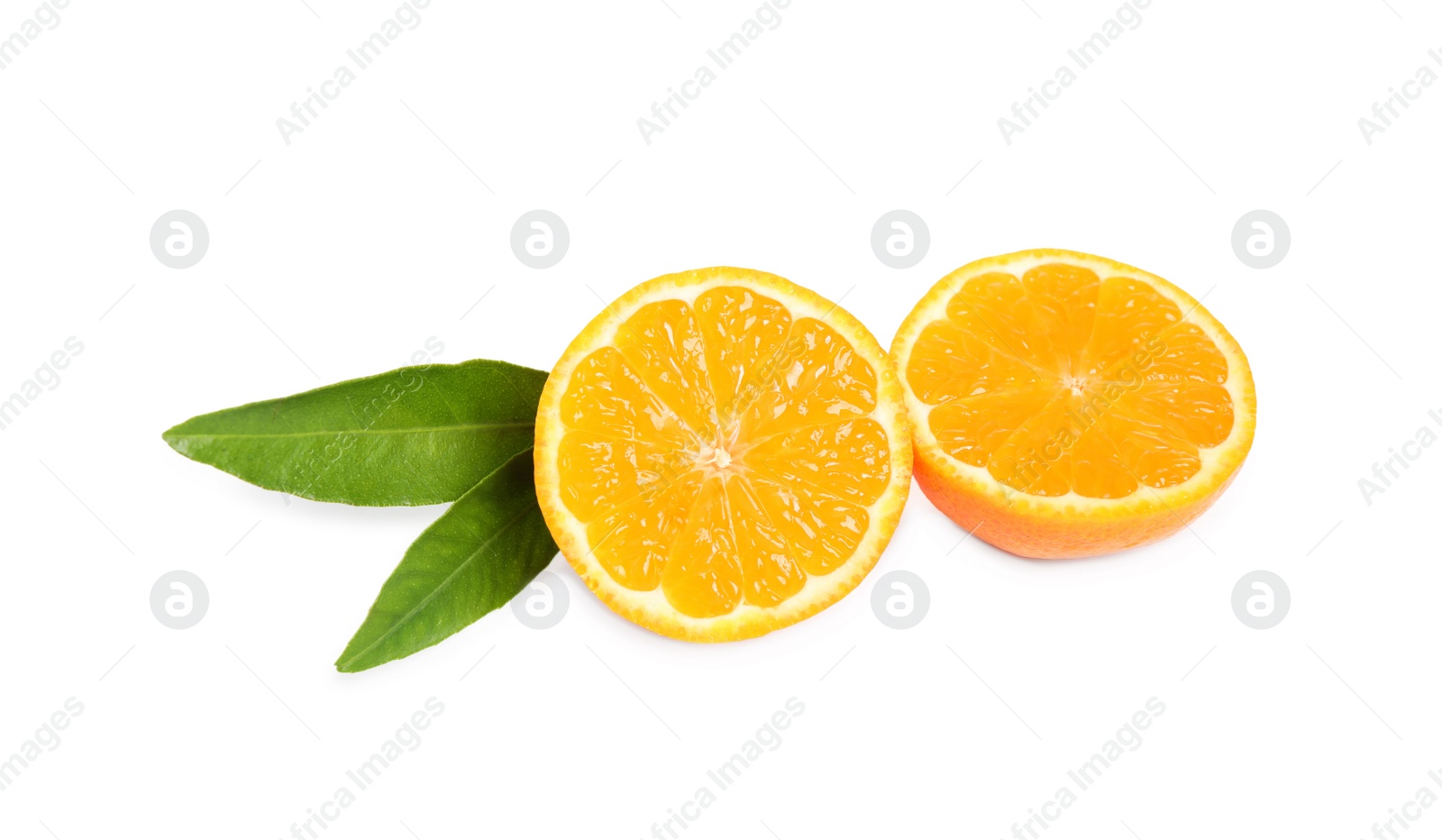 Photo of Halves of fresh ripe tangerine with leaves isolated on white. Citrus fruit