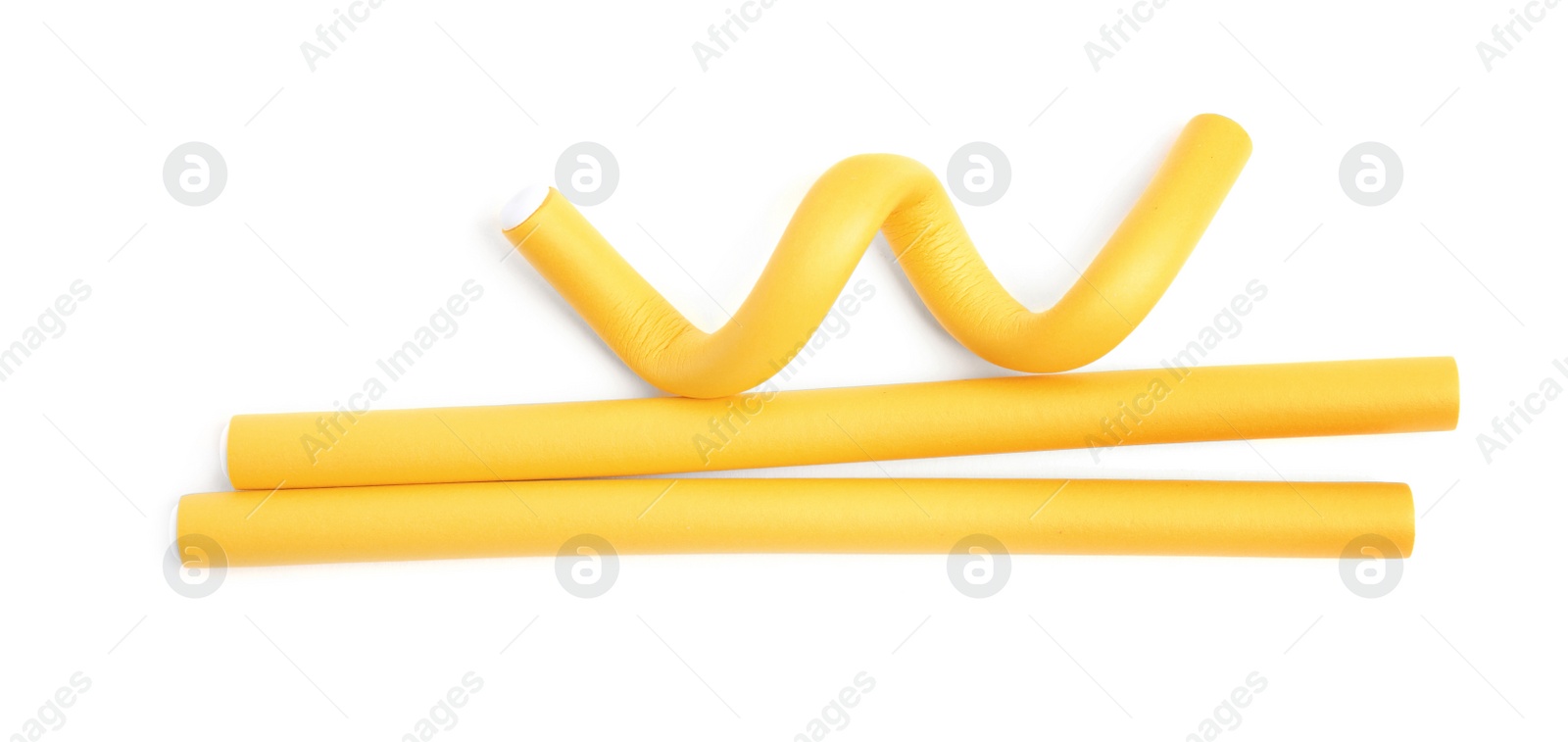 Photo of Curling rods isolated on white, top view. Hair styling tool