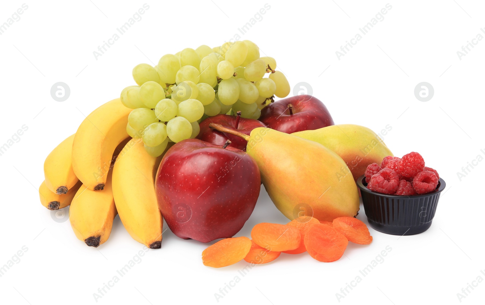 Photo of Delicious ripe fruits, raspberries and dried apricots isolated on white