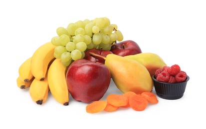 Delicious ripe fruits, raspberries and dried apricots isolated on white