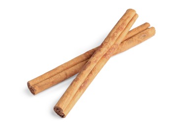 Photo of Two aromatic cinnamon sticks isolated on white