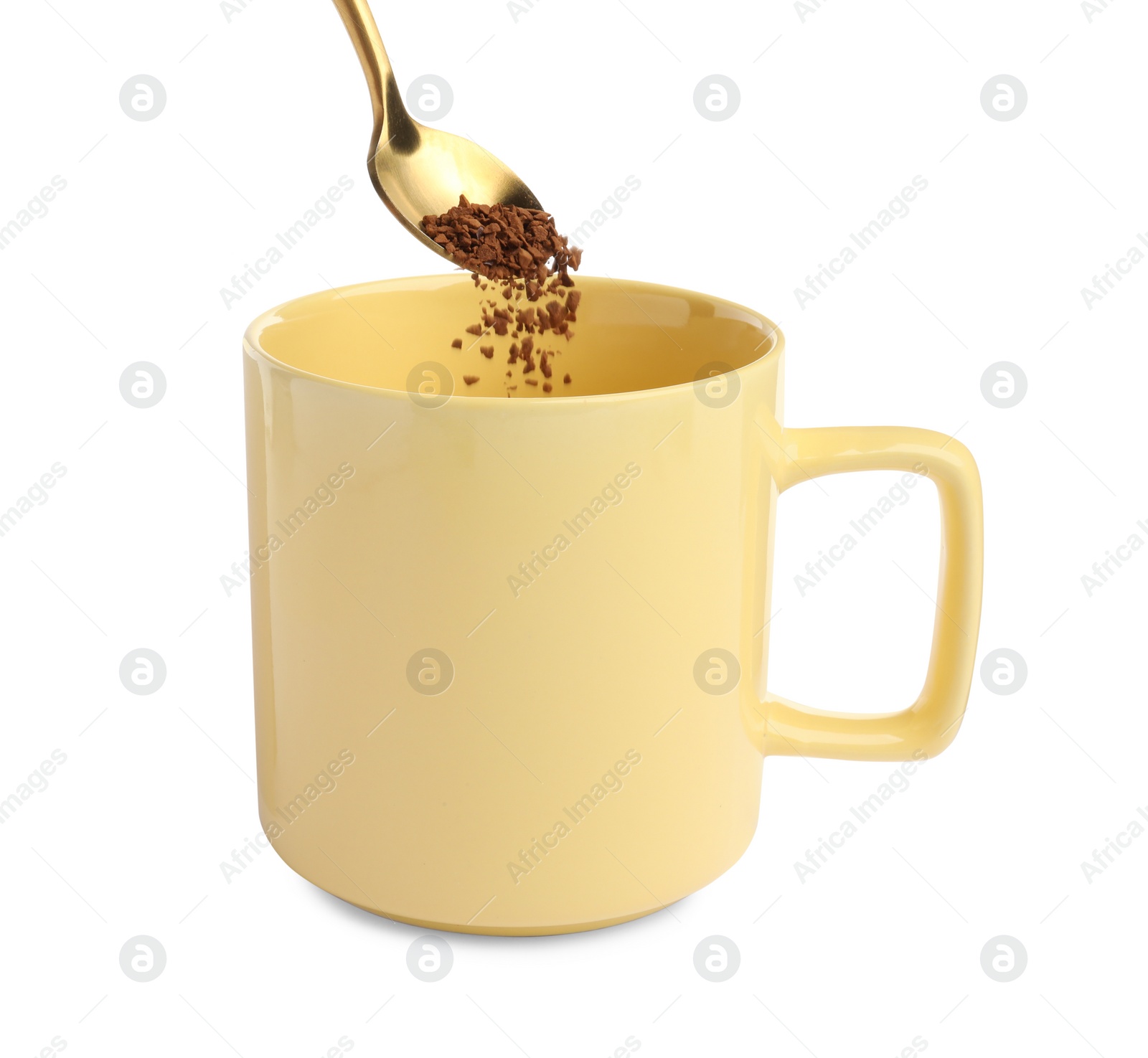 Photo of Pouring aromatic instant coffee into cup on white background