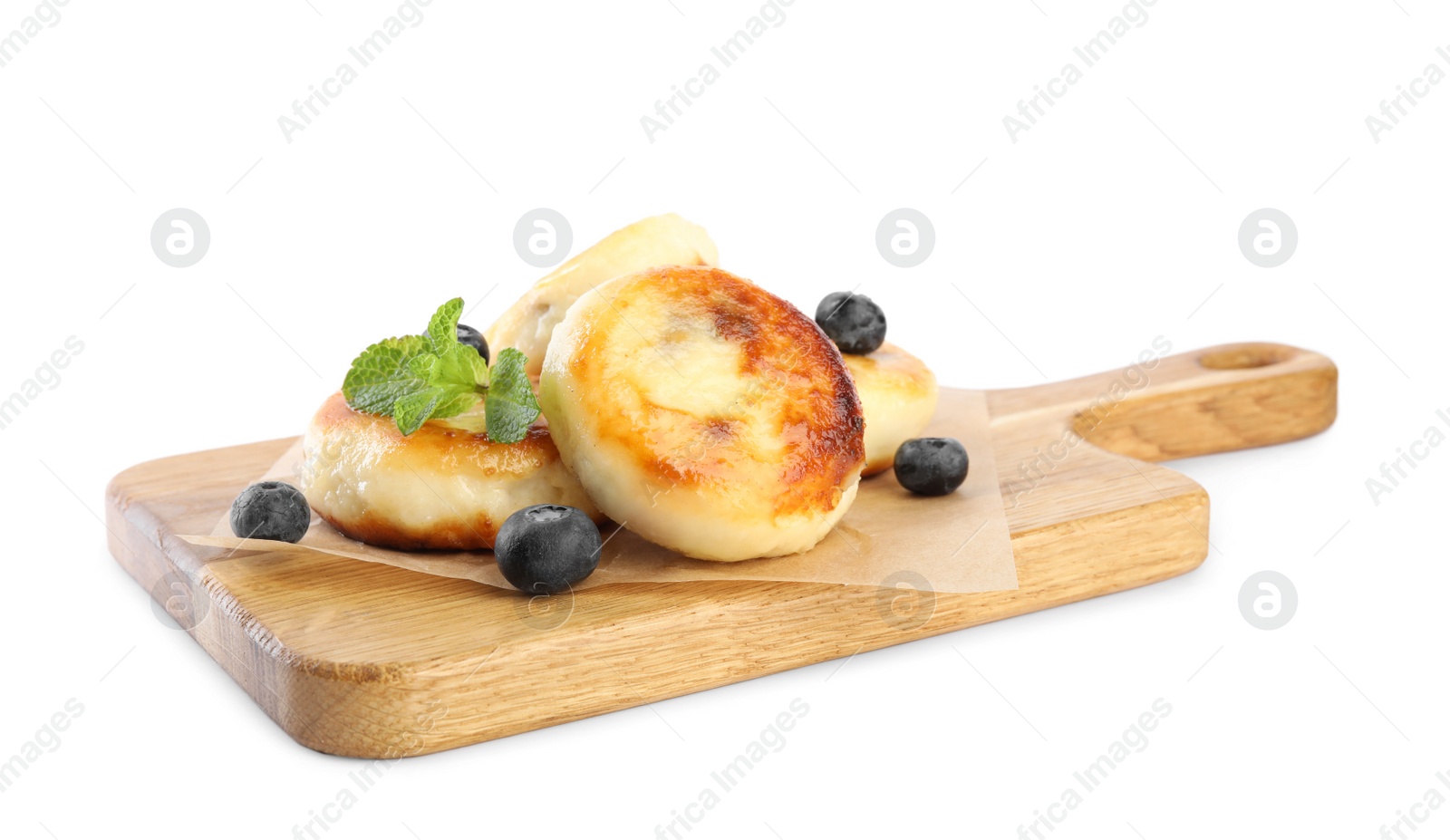 Photo of Delicious cottage cheese pancakes with blueberries and mint isolated on white