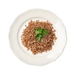 Photo of Plate with tasty buckwheat and fresh parsley isolated on white, top view